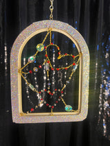 Small arched Gold frame with Red and Black Hearts