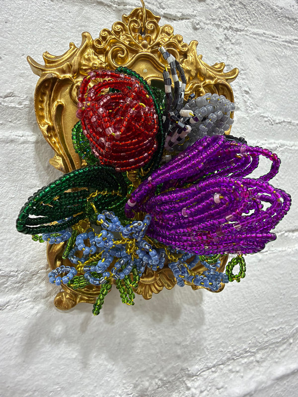 gold frame with large mixed flowers
