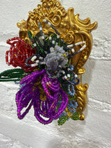 gold frame with large mixed flowers
