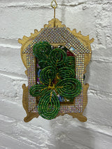 gold frame with large mixed flowers