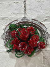 silver oval with a dozen roses