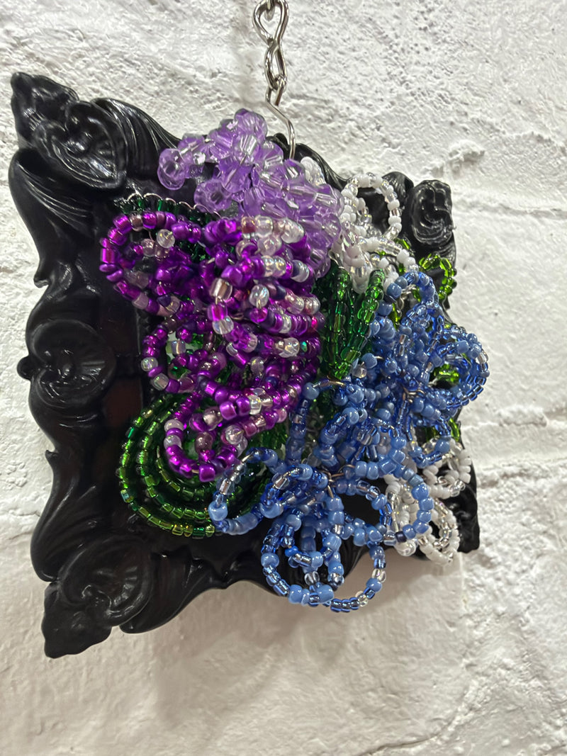 black square frame with purple & blue flowers