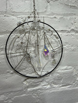 8 inch black circle with clear spider