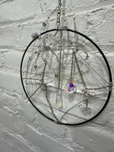 8 inch black circle with clear spider