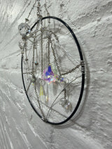 8 inch black circle with clear spider