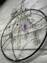 8 inch black circle with clear spider