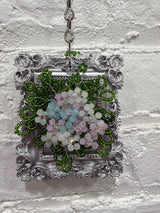 silver frame with pastel flowers & eucalyptus