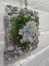 silver frame with pastel flowers & eucalyptus