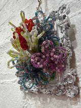 silver square frame with mixed wild flowers
