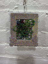 silver square frame with mixed wild flowers